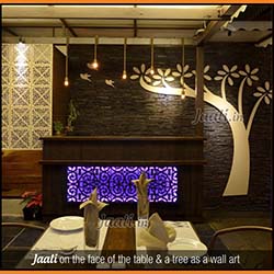 Jaali on the face of the table & a tree as a wall art copy